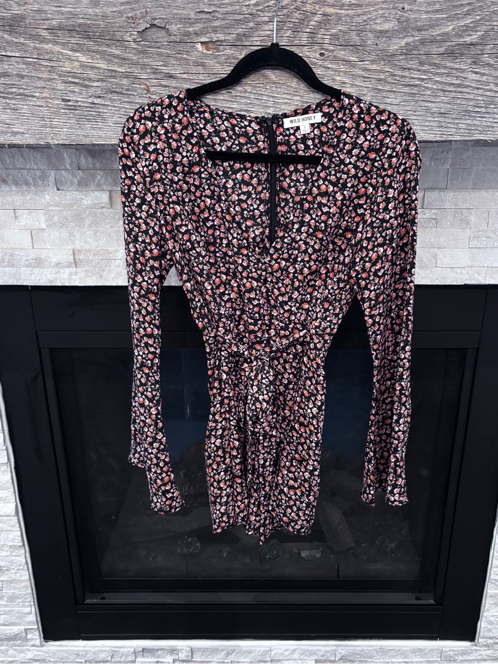 Wild Honey ditsy floral playsuit with long bell sleeves and a tie-front closure